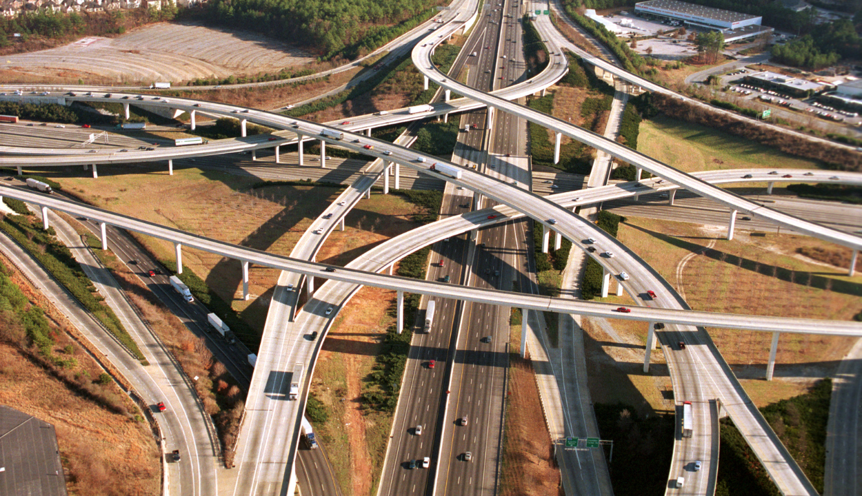 Aerial view of the intricate highway interchange in Atlanta, displaying a complex network of concrete ramps and roads