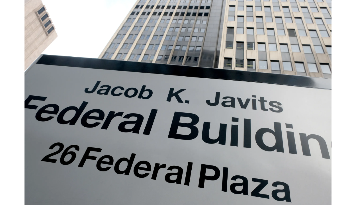 Jacob K. Javits Federal Office Building at 26 Federal Plaza written on a board outside the building
