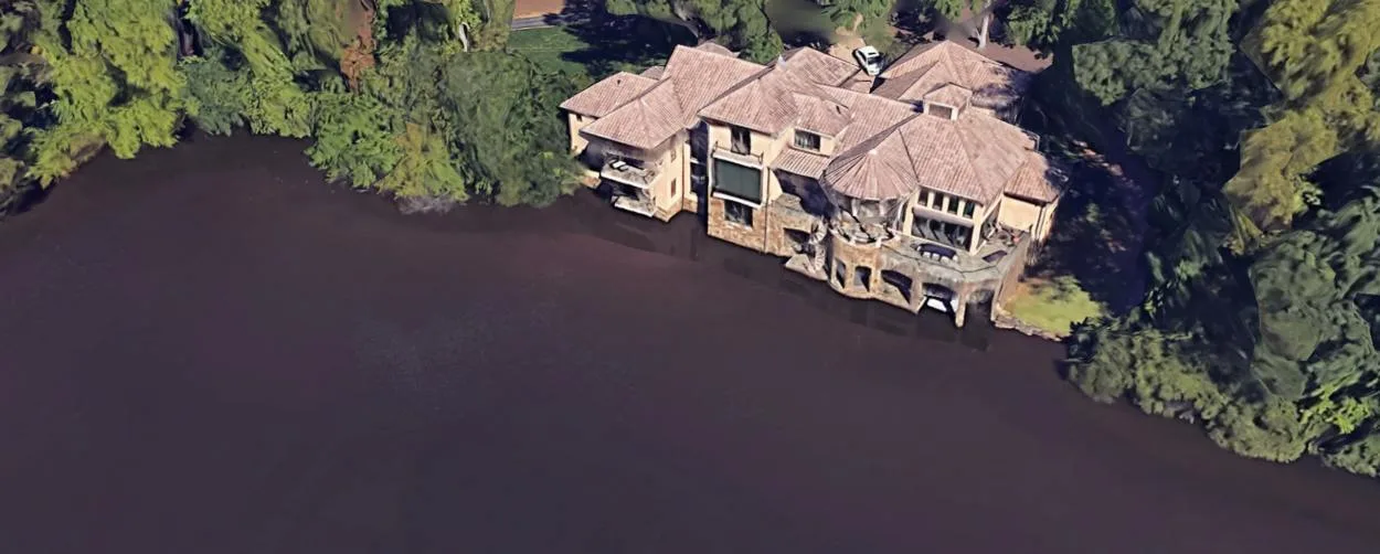 Lake side mansion aerial view